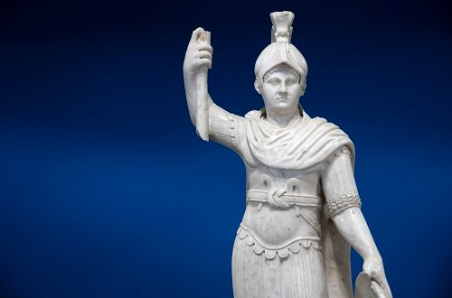 The Greco-Roman Museum in Alexandria with its restored façade, historic columns, and entrance surrounded by Mediterranean architectural details.