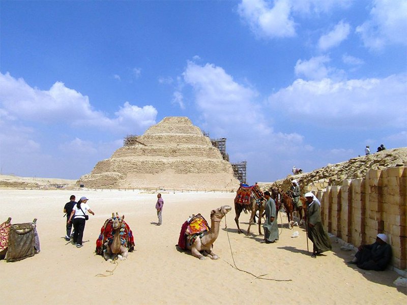 Visit Saqqara and Memphis, where Egypt’s oldest pyramid and ancient statues reveal the origins of pharaonic civilization.